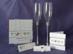 A collection of retro looking invitations with a heart theme 